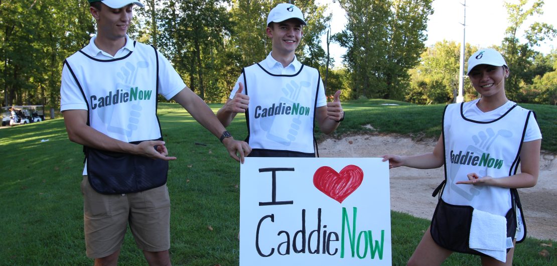 High school golfers caddy